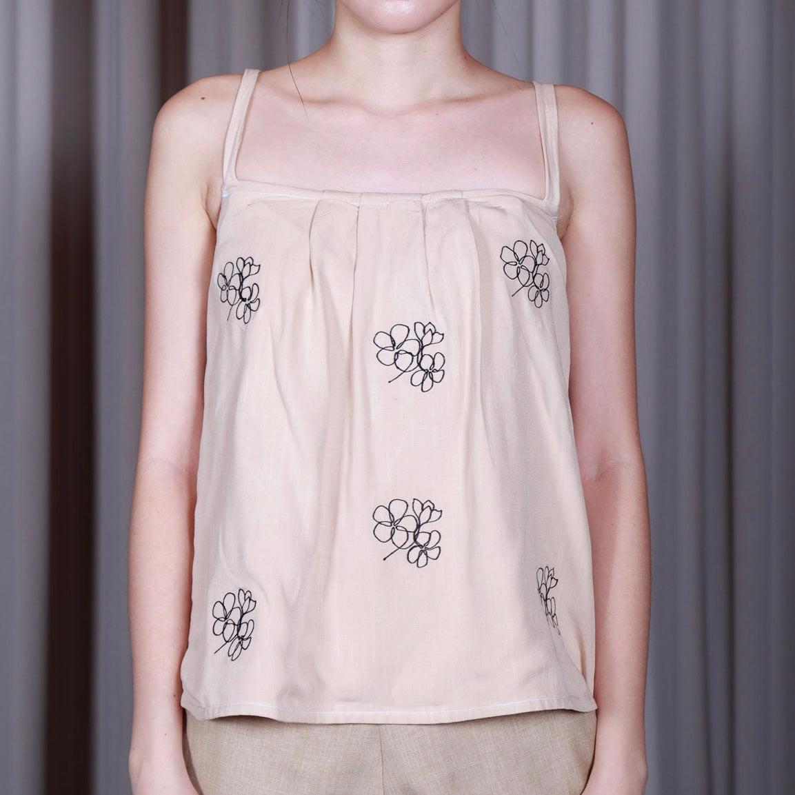 Sleeveless Top with Frangipani Embroidery
